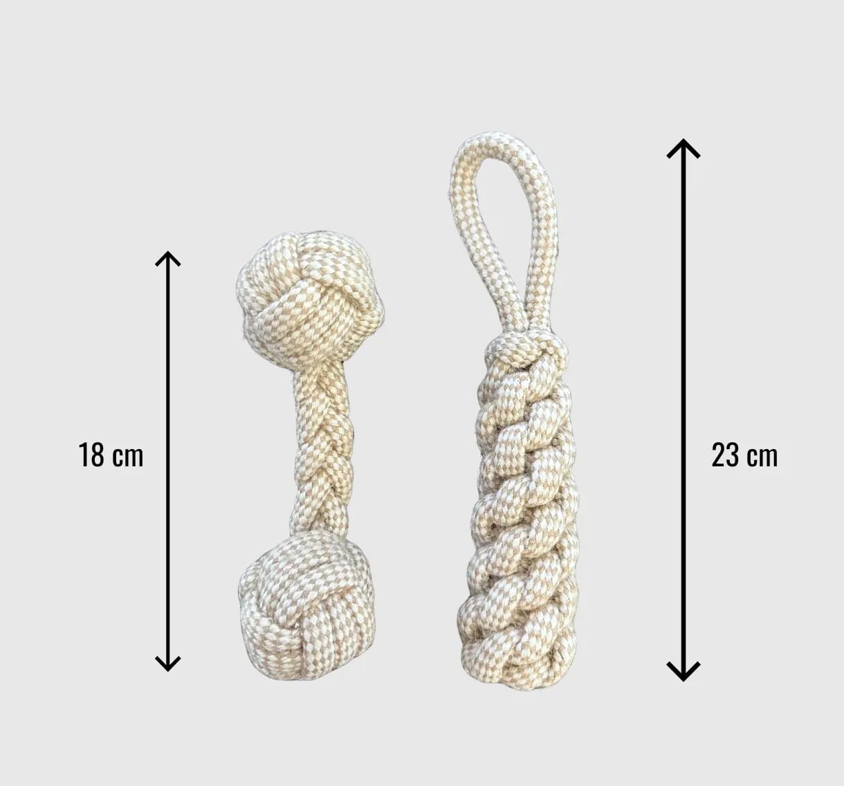 Two linen rope dog toys with size measurements. A dumbbell-shaped toy is 18 cm long, and a corncob-shaped toy with a loop is 23 cm long.